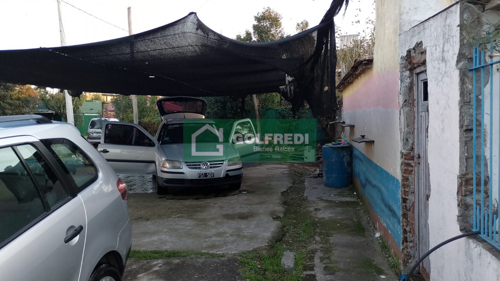 Terreno con mejoras en Matheu