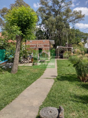 Terreno con dos casas en Benavidez