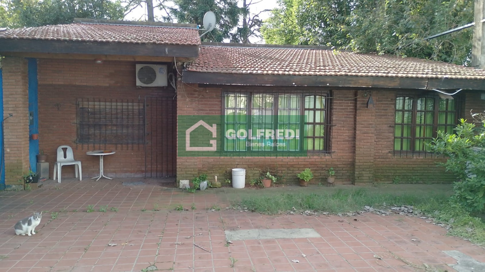 Terreno con casa a reciclar